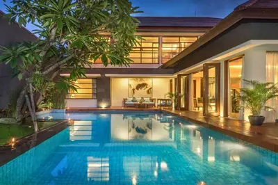 a swimming pool in the backyard of a house at Luxury 3 BR Private Pool Villa in Seminyak