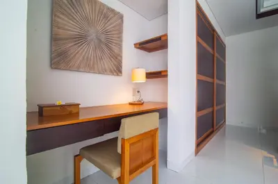 a home office with a desk and a chair at Rekso Villa in Jimbaran