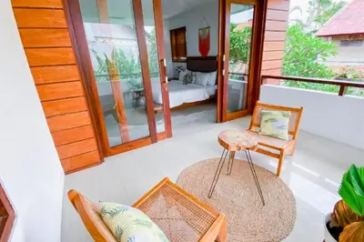 a living room with a bed and a bedroom at Spacious 2 BR Private Pool Villa ZN108 in Seminyak
