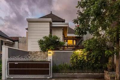 a house with a gate in front of it at Comfy 3bd Family Villa with Private Pool in Central Location in Kerobokan