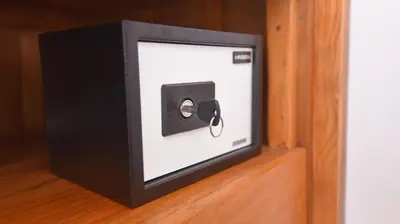 a small black box with a key in it at Queen Villa Seminyak in Seminyak