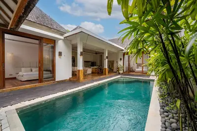 a pool in the backyard of a villa at Villa Chloe by Pertama Management in Seminyak
