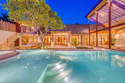 a swimming pool in the backyard of a house at Villa Vienna - New 8BDR Jacuzzi Sauna and Cinema in Seminyak