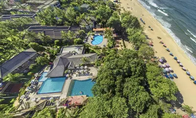 an aerial view of a resort and a beach at Sunset Suites, 1 bed apartment, Jayakarta hotel in Seminyak