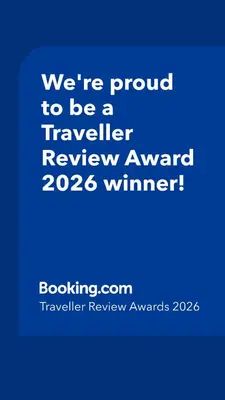 a blue sign that says were proud to be a traveller reviewagency winner at Villa Teratai in Seminyak