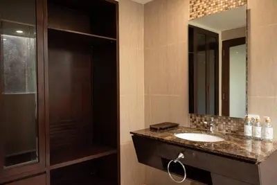 a bathroom with a sink and a shower at Balinese stile villa in Nusa Dua