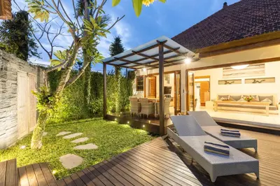a patio of a house with a garden at 2 Bedroom Villa with Pool Seminyak with Car Park in Seminyak