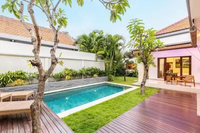 an image of a backyard with a swimming pool and a house at Seminyak lush tropical paradise close to Eatstreet in Seminyak
