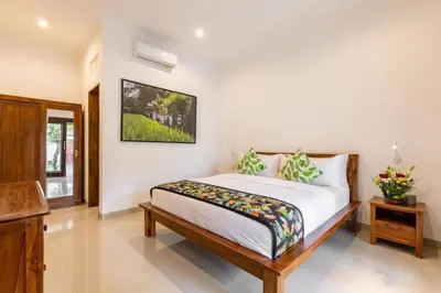 a bedroom with a bed in a room at Seminyak lush tropical paradise close to Eatstreet in Seminyak