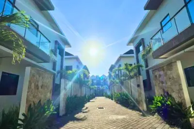 a view of a street between two buildings at Cakrawala 3 Bedroom Villa in Jimbaran