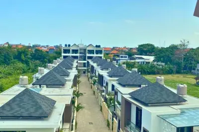 an overhead view of a row of houses with roofs at Cakrawala 3 Bedroom Villa in Jimbaran