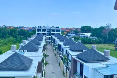 an overhead view of a row of houses with roofs at Narendra 1 BR Apartment in Jimbaran