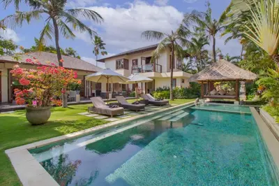 a swimming pool in the backyard of a villa at Super Spacious, 6 Bed, Chef, Daily B'Fast, 12 pax in Seminyak