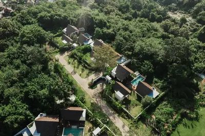 an aerial view of a house in the woods at Arpana Luxury Private Pool Villas in Jimbaran