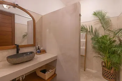 a bathroom with a sink and a mirror at Cozy 2 beds villa in Seminyak in Seminyak