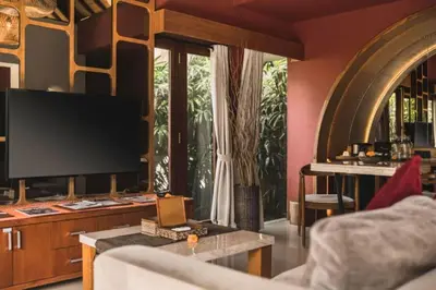 a living room with a tv and a couch at Sadawira 1 BR Private Pool Villa & Bathtub ZN168 in Legian