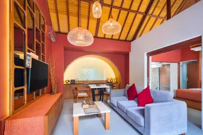 a living room with a couch and a table at Sadawira 1 BR Private Pool Villa & Bathtub ZN168 in Legian