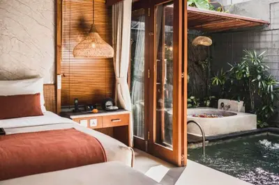 a bedroom with a bathtub and a bed and a tub at Sadawira 1 BR Private Pool Villa & Bathtub ZN168 in Legian