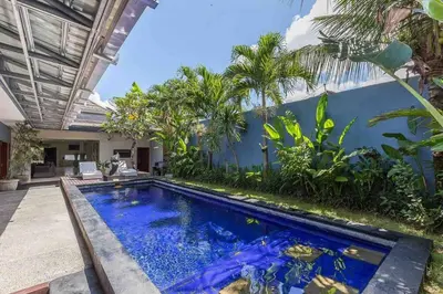 a swimming pool in the backyard of a villa at Big 3 bed, to BatuBelig Beach, last min specials in Kerobokan