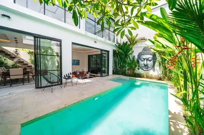 an image of a swimming pool in a house at Villa Blue Water by GORO in Seminyak