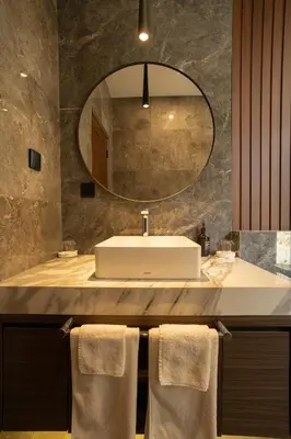 a bathroom with a sink and a mirror at Nococu Luxury Villa in Seminyak