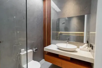 a bathroom with a sink and a toilet and a shower at Luxury Haven Stunning 2Br in Umalas Canggu in Kerobokan