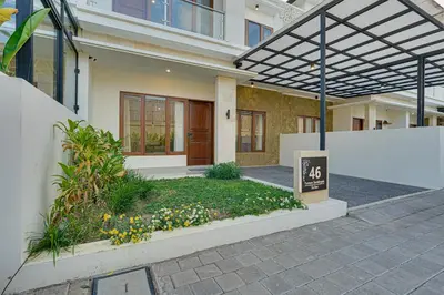 a building with a sign in front of it at Villa Taman Seminyak 46 Near Double Six Beach in Seminyak