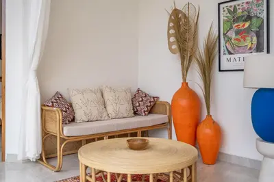 a living room with a couch and a table at Kubung 2 - Perfect Retreat in Canggu in Kerobokan