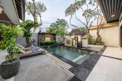 a swimming pool in the backyard of a house at QLO Villa , Seminyak in Seminyak