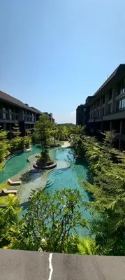 a river in the middle of a city with buildings at de' Asasta Apartment Benoa E216 in Nusa Dua
