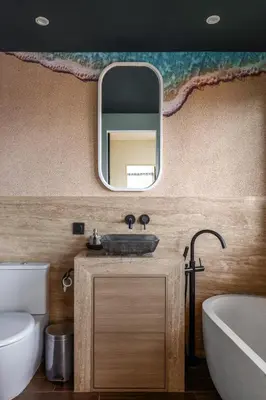 a bathroom with a sink and a mirror at Aviator Bali in Canggu
