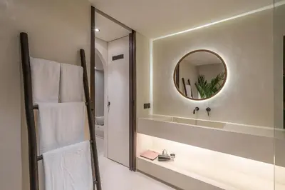 a bathroom with a mirror and a sink at Casa Vera - Delightful 1-Bedroom Villas in the Heart of Umalas in Canggu