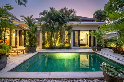 a swimming pool in the backyard of a house at Villa Eleni - Your Private Oasis in Seminyak - A Hosted Luxury Boutique Villa in Seminyak