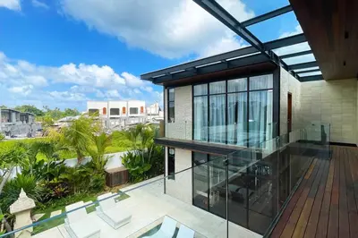 an open balcony of a house with a view at Luxury Villa Gym Pool and Gazebo in Canggu