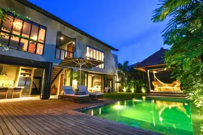 an exterior view of a house with a swimming pool at Saanvi 2 BR Private Pool Villa in Canggu