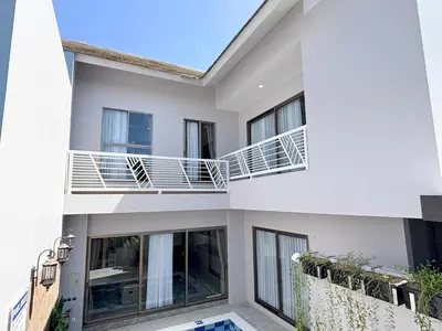 a view of the outside of a house with balconies at Bellagio Villas in Seminyak