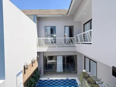a view of a house with a swimming pool at Bellagio Villas in Seminyak