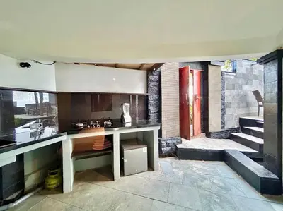 a kitchen with a sink and a counter top at Sunset view apartment in Nusa Dua in Nusa Dua