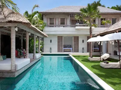 a villa with a swimming pool and a resort at Villa Adasa by Elite Havens in Seminyak