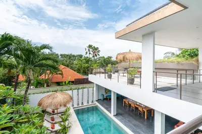 an image of the balcony of a resort with a swimming pool at Beautiful modern villa in the heart of Seminyak in Seminyak