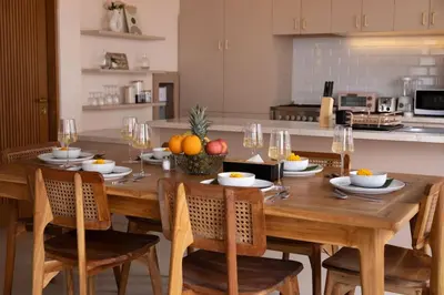 a wooden table in a kitchen with fruit on it at Villa Umi Paradise Bliss 3BD Villa in Prime Area in Umalas