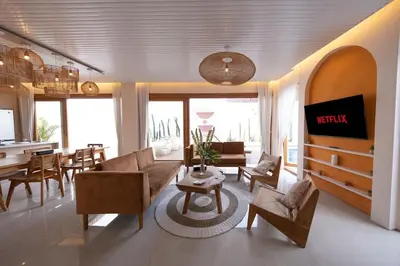 a living room with a couch and a table at Villa Umi Paradise Bliss 3BD Villa in Prime Area in Umalas