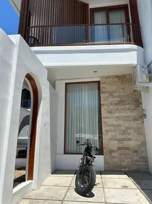 a motorcycle parked in front of a building at Villa with pool Nusa Dua in Nusa Dua