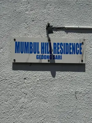 a sign on the side of a building at Villa with pool Nusa Dua in Nusa Dua