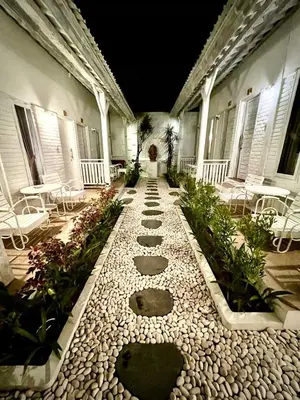 a walkway in the middle of a building at Baliview homestay in Umalas