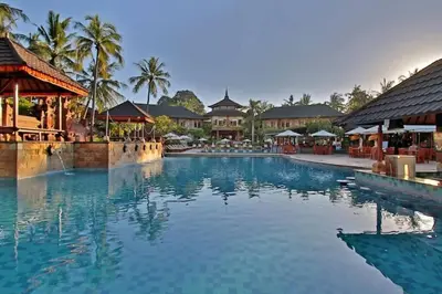 a large swimming pool in front of a resort at Private Apartment 6244 at Jayakarta Residence in Seminyak
