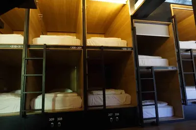 a group of bunk beds in a room at M Boutique Hostel in Seminyak