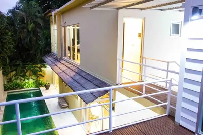 a balcony of a house with a railing at Elegant 5 Bdr villa in the heart of Seminyak in Seminyak