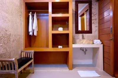 a bathroom with a sink and a mirror at T&J1 - Gorgeous 1BR pool villa, parking, walk to beach! in Umalas