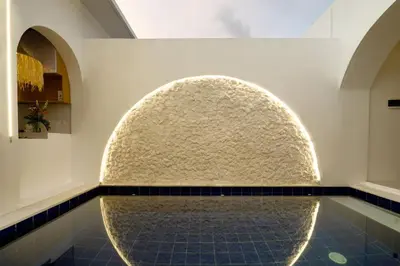 a bathroom with a large stone sink in a wall at T&J4 - Romantic 1BR pool villa, walk to beach in Umalas